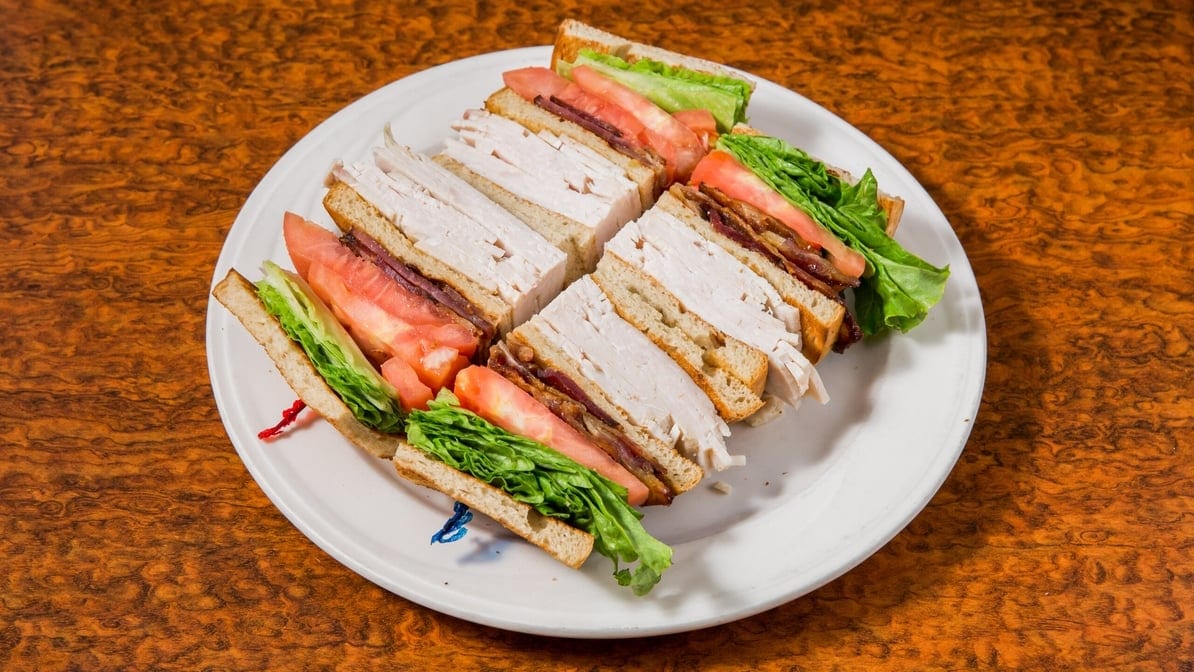 Sliced Turkey and Bacon Triple Decker.